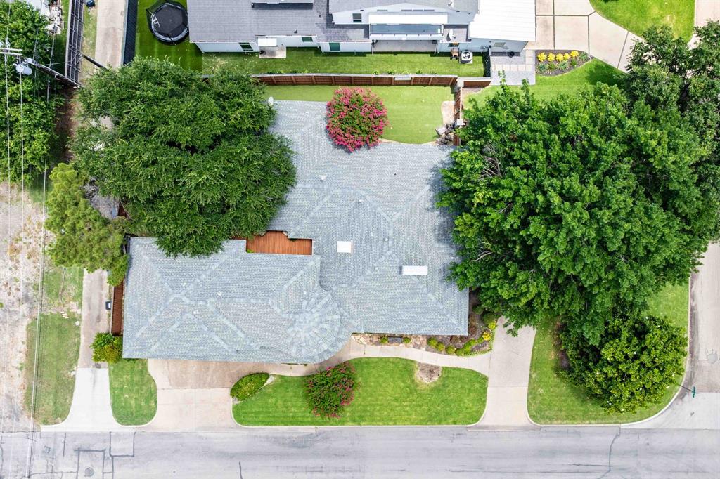 6405 Azalea Lane Dallas, TX 75230 - Photo 3 of 11 an aerial view of a house with outdoor space and lake view