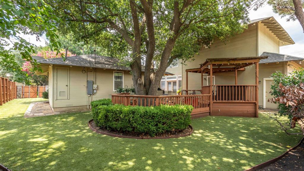 6405 Azalea Lane Dallas, TX 75230 - Photo 7 of 11 a view of a house with a yard and sitting area