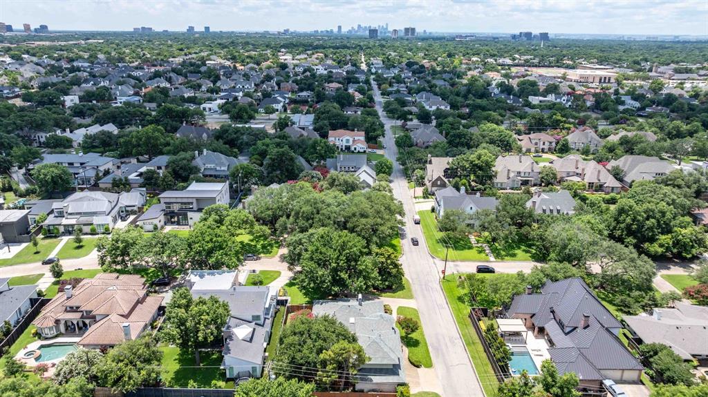 6405 Azalea Lane Dallas, TX 75230 - Photo 10 of 11 an aerial view of residential houses with outdoor space