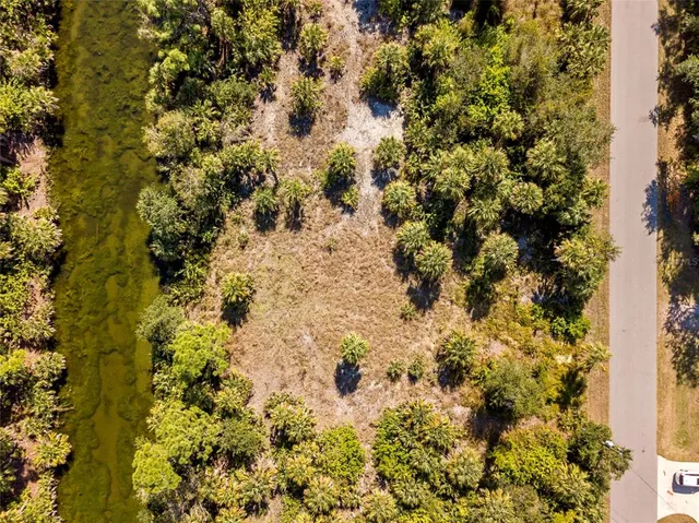 a view of a lake with houses in outdoor space