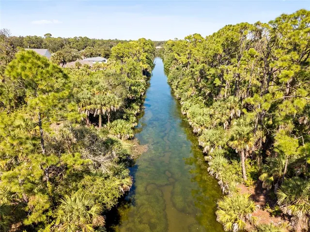 a view of a pathway with a yard