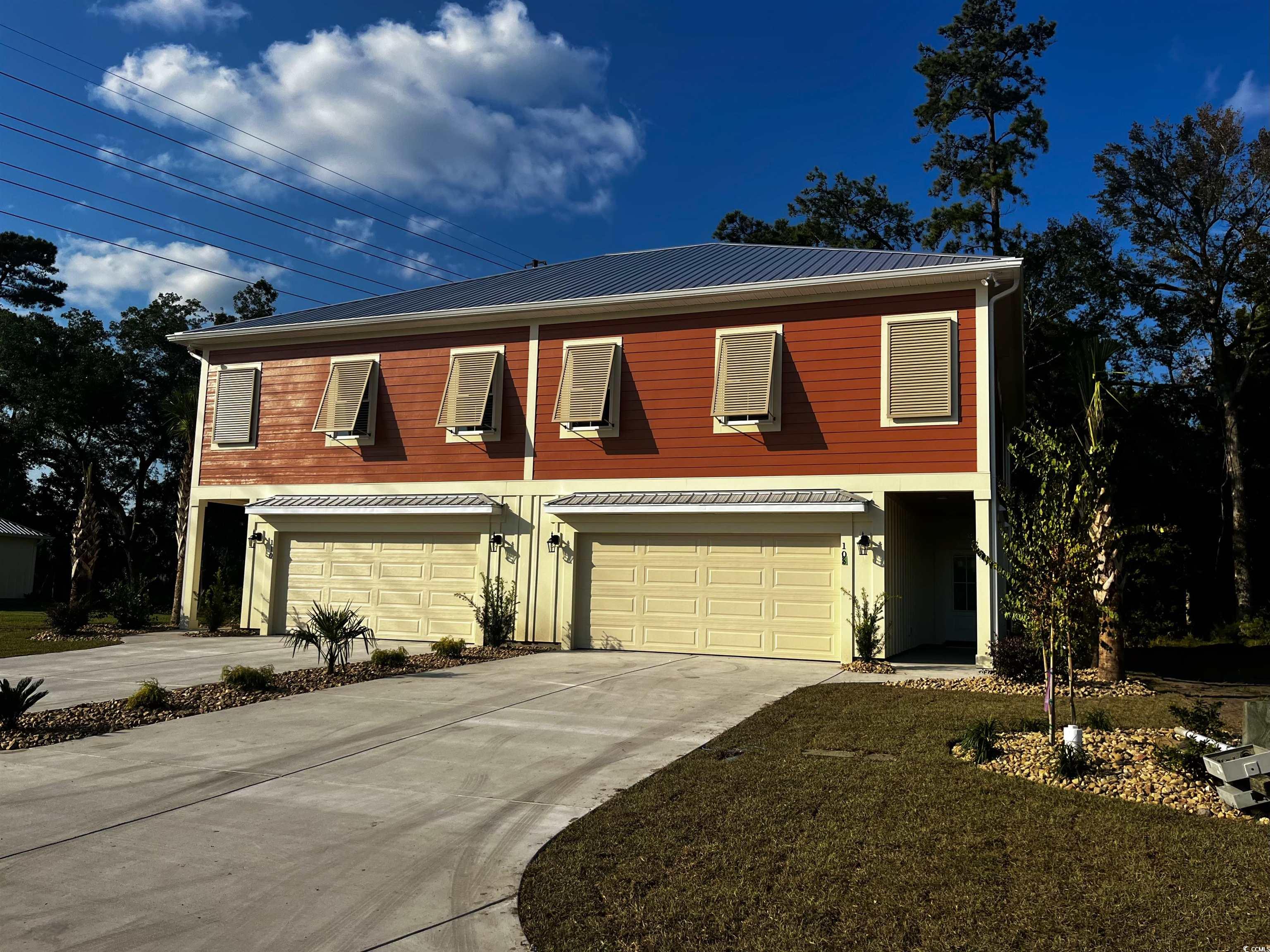108 Hallandale Lane Murrells Inlet, SC 29576 - Photo 1 of 28 View of front facade with a garage