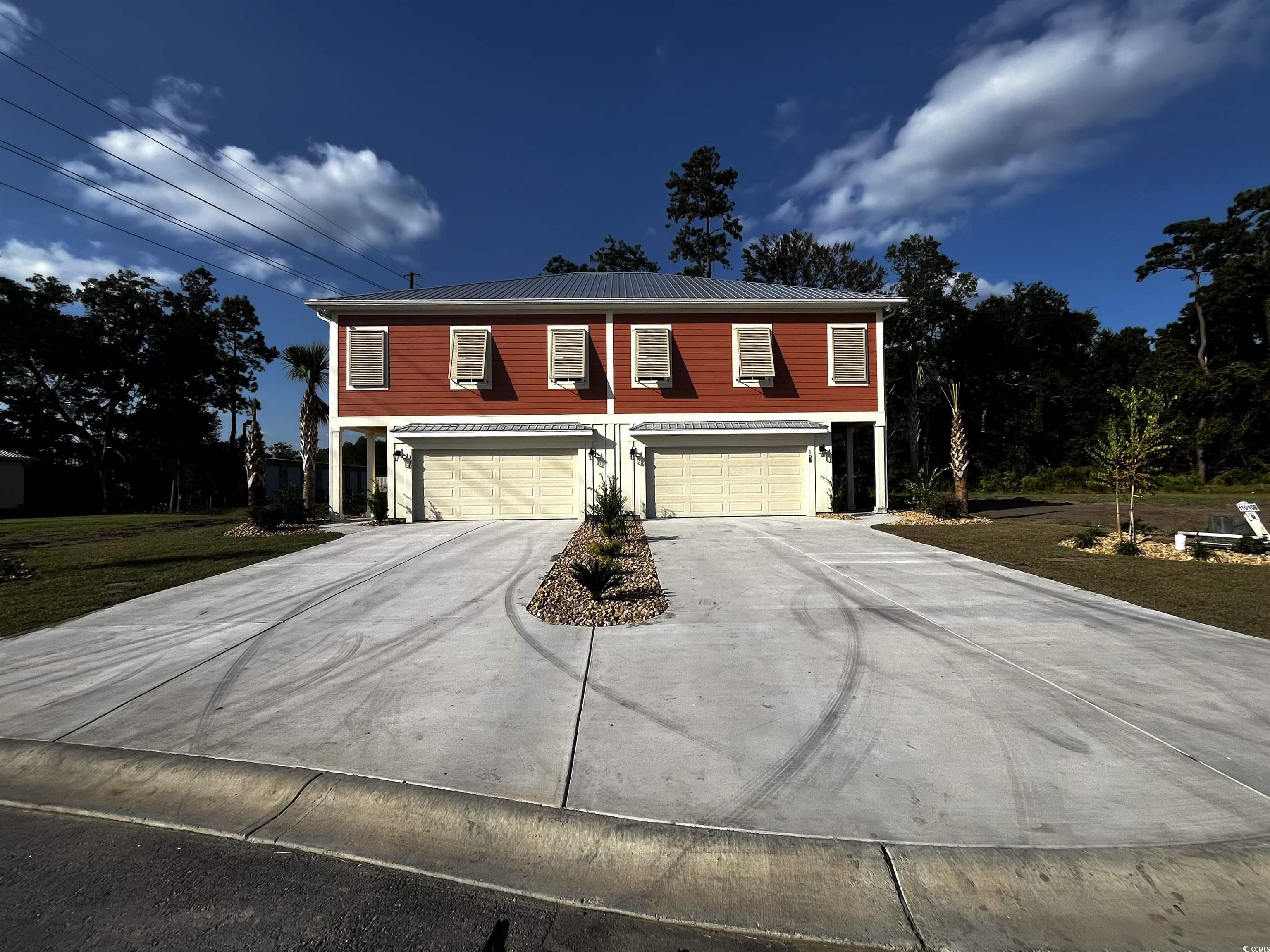 108 Hallandale Lane Murrells Inlet, SC 29576 - Photo 2 of 28 View of property featuring a garage