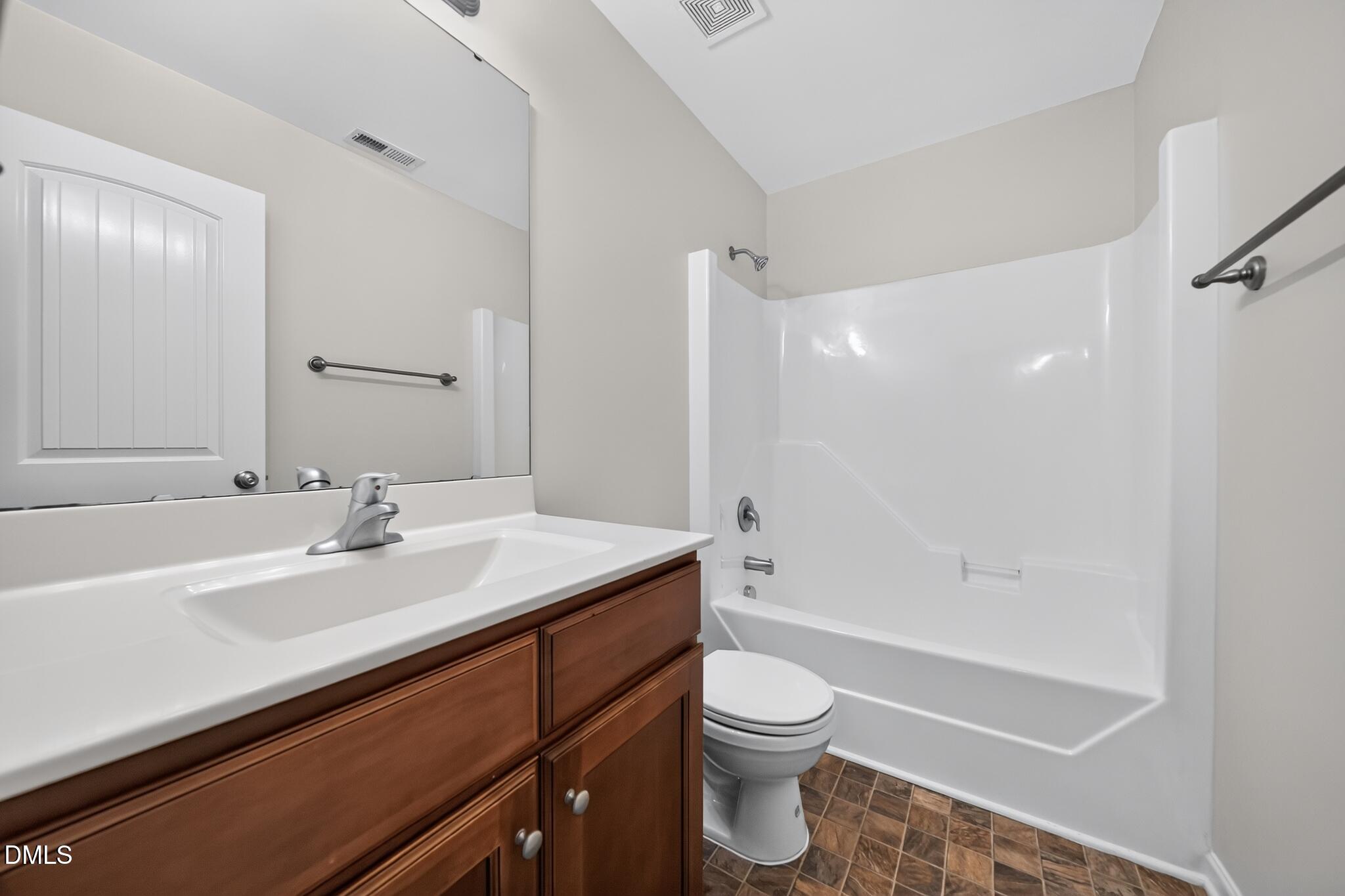 6443 Hatchies Drive Raleigh, NC 27610 - Photo 12 of 19 20_6443_Hatchies_Dr-Bathroom-0712