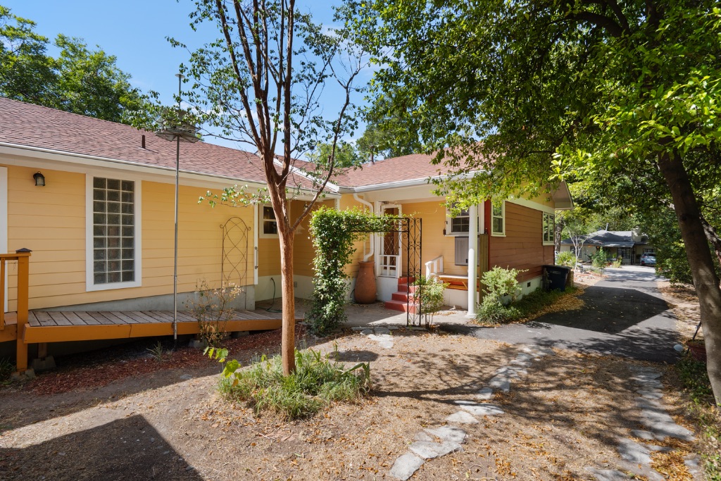1212 Bentwood Road Austin, TX 78722 - Photo 28 of 32 a view of a house with a yard
