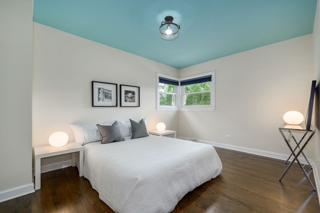 1700 Marvin Parkway Park Ridge, IL 60068 - Photo 13 of 26 a bedroom with a bed and a chair
