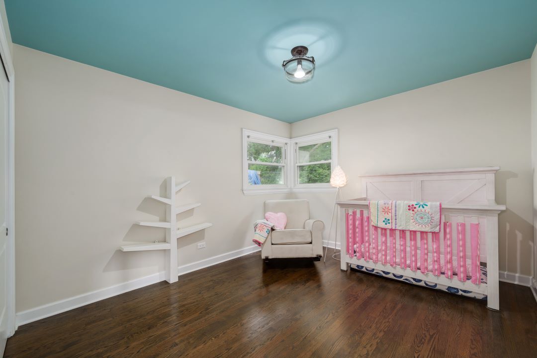 1700 Marvin Parkway Park Ridge, IL 60068 - Photo 14 of 26 a bed room with a bed and window