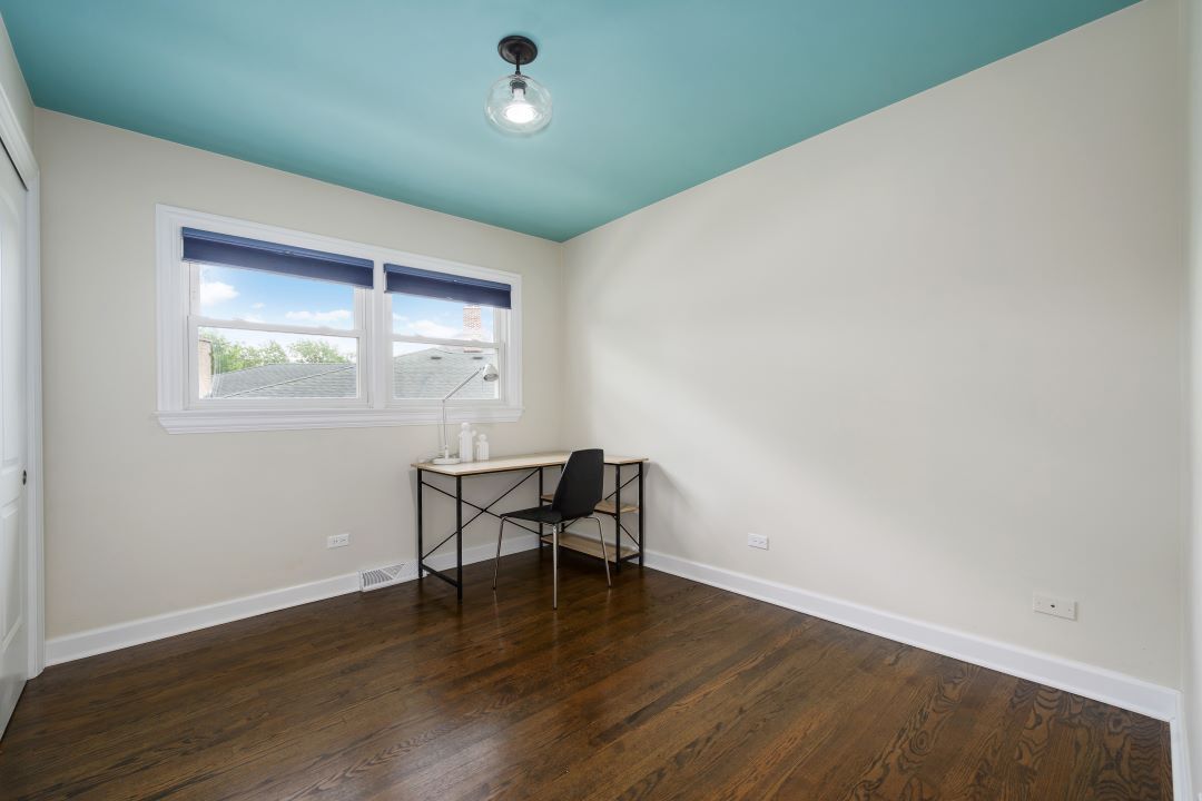 1700 Marvin Parkway Park Ridge, IL 60068 - Photo 15 of 26 an empty room with wooden floor and windows