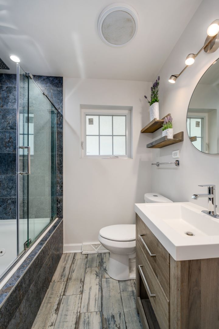 1700 Marvin Parkway Park Ridge, IL 60068 - Photo 17 of 26 a bathroom with a sink a toilet and shower