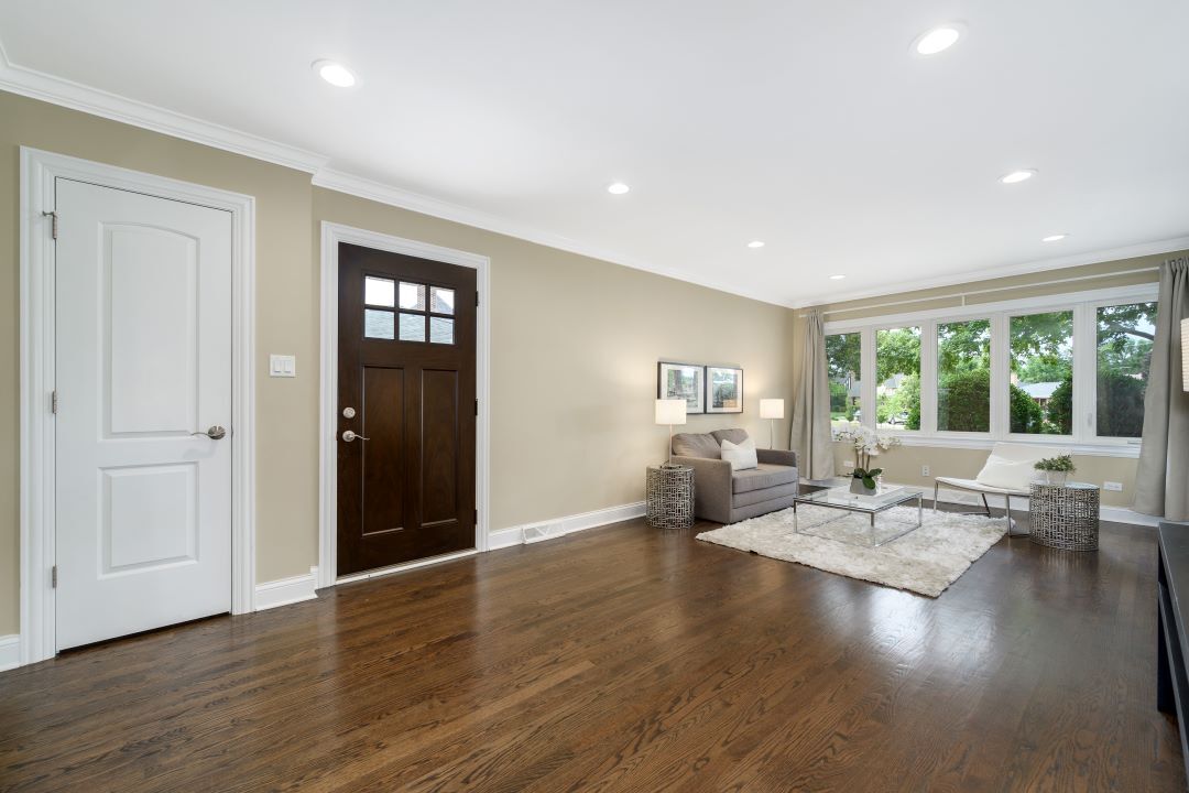 1700 Marvin Parkway Park Ridge, IL 60068 - Photo 3 of 26 a living room with couches and kitchen view with wooden floor