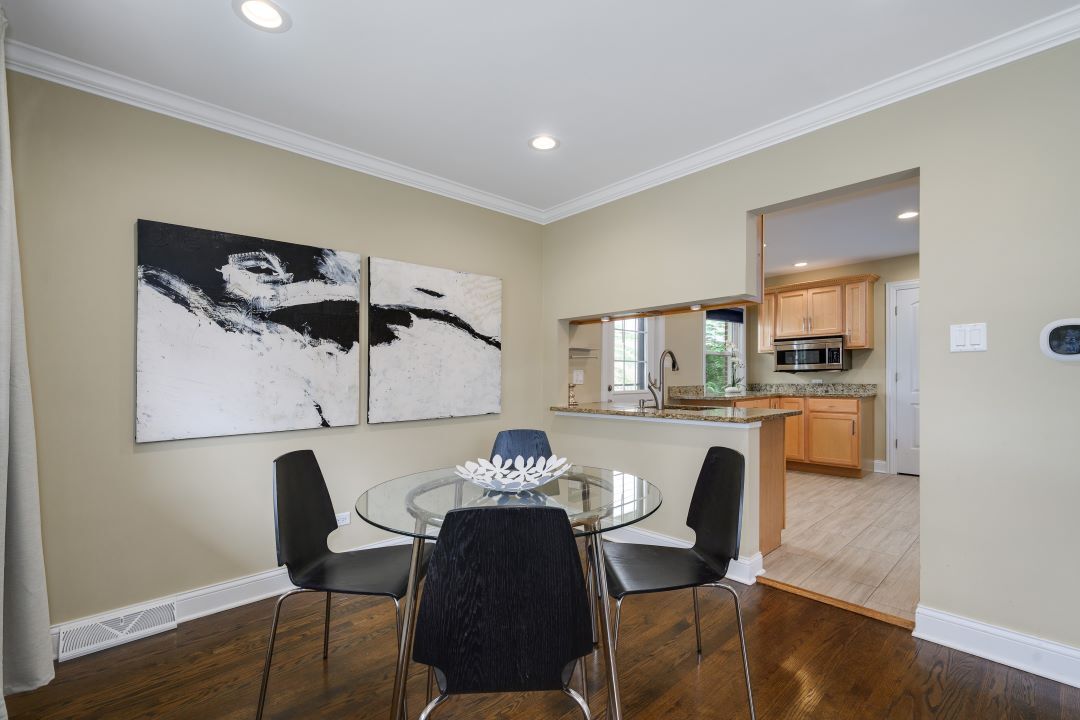 1700 Marvin Parkway Park Ridge, IL 60068 - Photo 9 of 26 a view of a dining room with furniture and wooden floor
