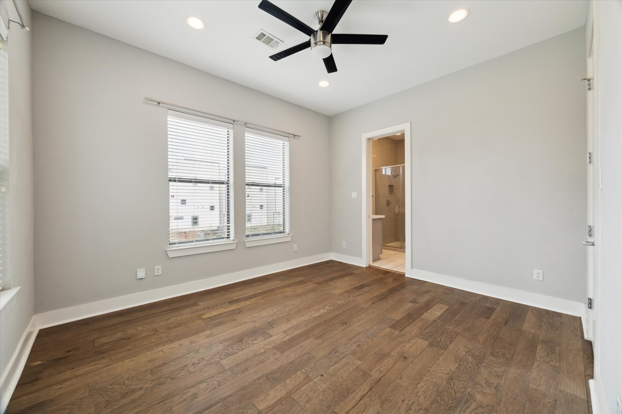 614 Thornton Road, Unit G Houston, TX 77018 - Photo 11 of 18 a view of an empty room with a window