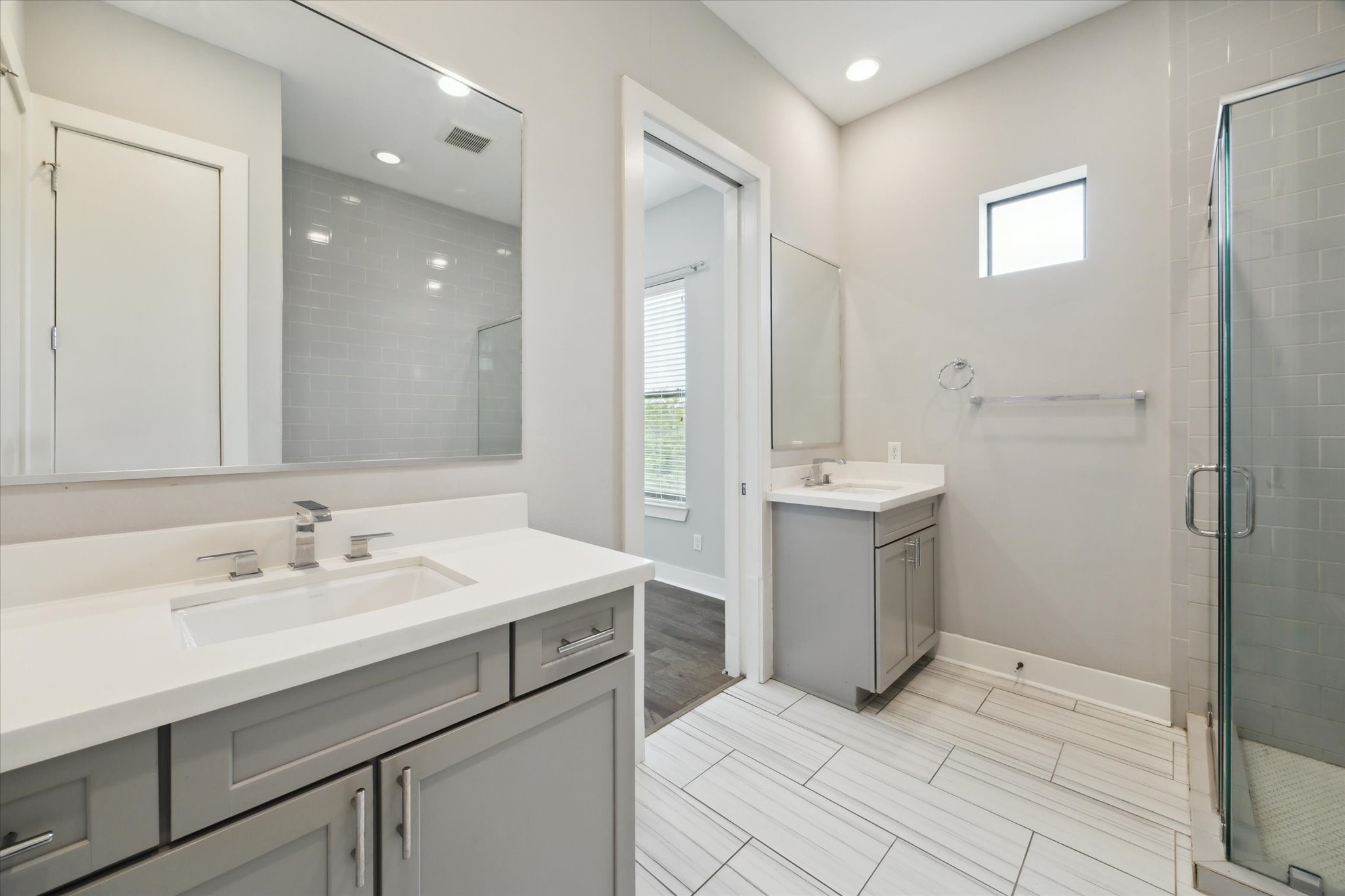 614 Thornton Road, Unit G Houston, TX 77018 - Photo 12 of 18 a bathroom with a sink and a mirror