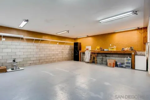a view of a livingroom with a furniture and garage