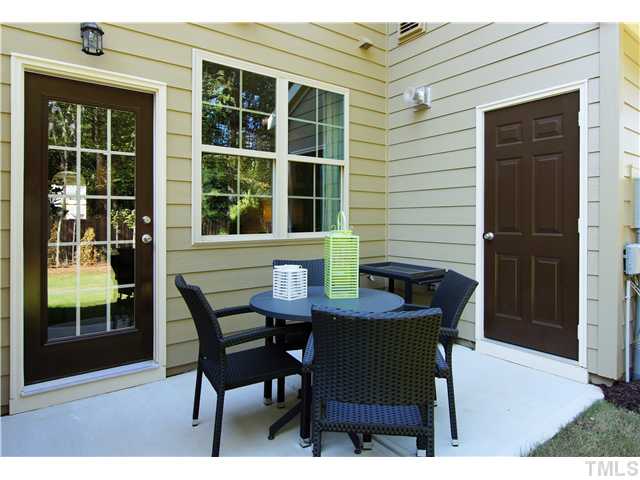 764 Wickham Ridge Road, Unit 108 Apex, NC 27539 - Photo 17 of 20 a dining room with furniture and window
