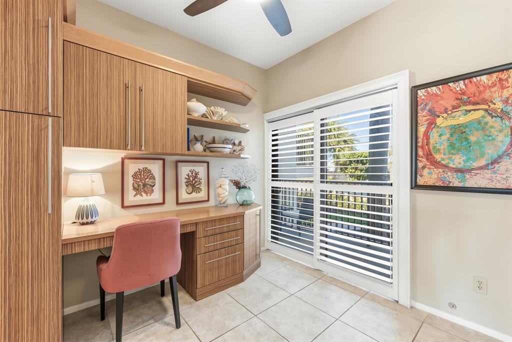 5000 Gasparilla Road, Unit 53A Boca Grande, FL 33921 - Photo 12 of 55 a view of a workspace with furniture and a window