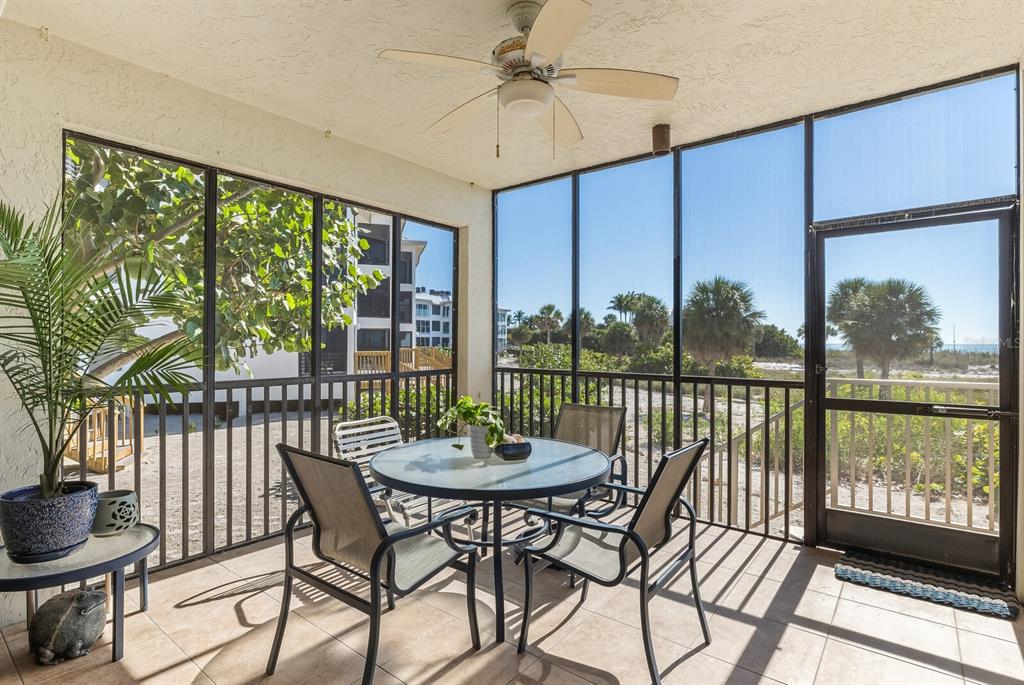 5000 Gasparilla Road, Unit 53A Boca Grande, FL 33921 - Photo 20 of 55 a view of a dining room with furniture window and outside view