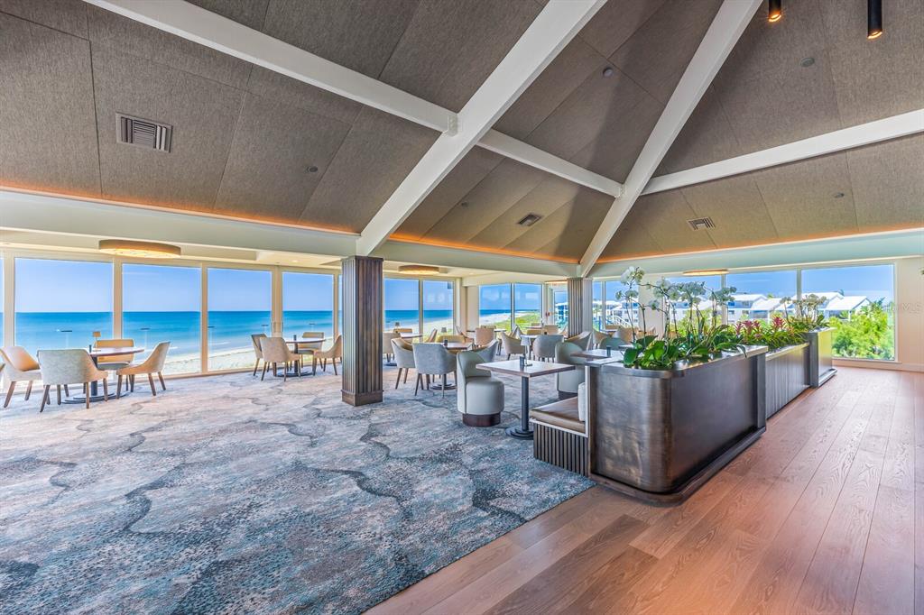 5000 Gasparilla Road, Unit 53A Boca Grande, FL 33921 - Photo 40 of 55 a living room with furniture and a flat screen tv