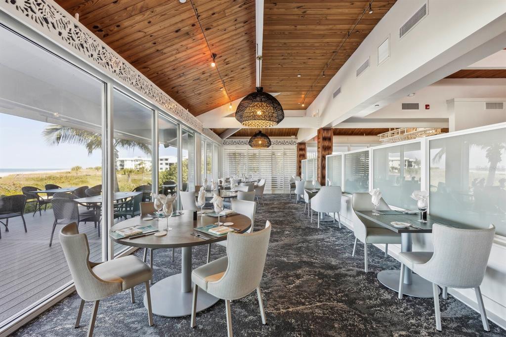 5000 Gasparilla Road, Unit 53A Boca Grande, FL 33921 - Photo 47 of 55 a outdoor space with lots of tables and chairs