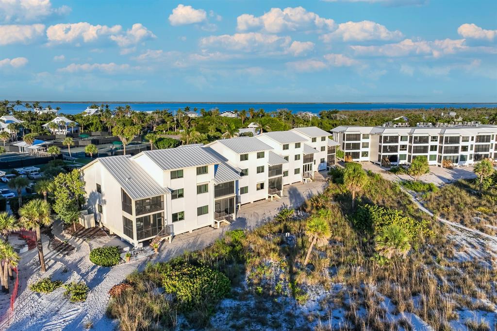 5000 Gasparilla Road, Unit 53A Boca Grande, FL 33921 - Photo 6 of 55 a view of a building with an outdoor space