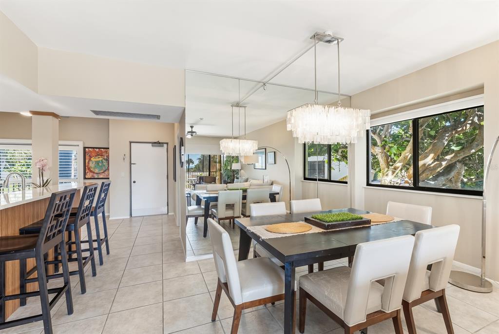 5000 Gasparilla Road, Unit 53A Boca Grande, FL 33921 - Photo 8 of 55 a view of a dining room with furniture window and outside view