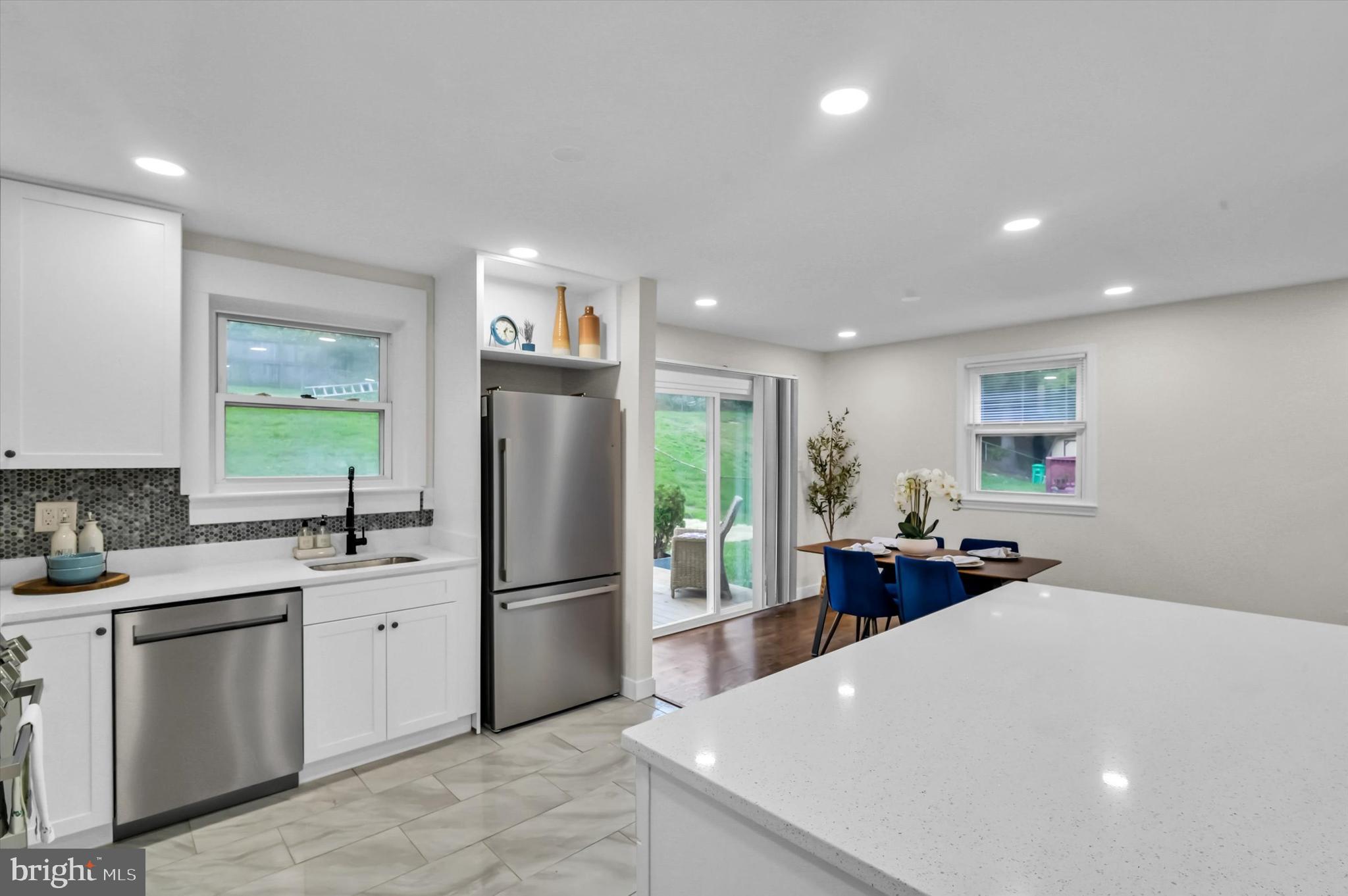6514 Northam Road Temple Hills, MD 20748 - Photo 21 of 32 Quartz counters/kitchen island/generous cabinetry
