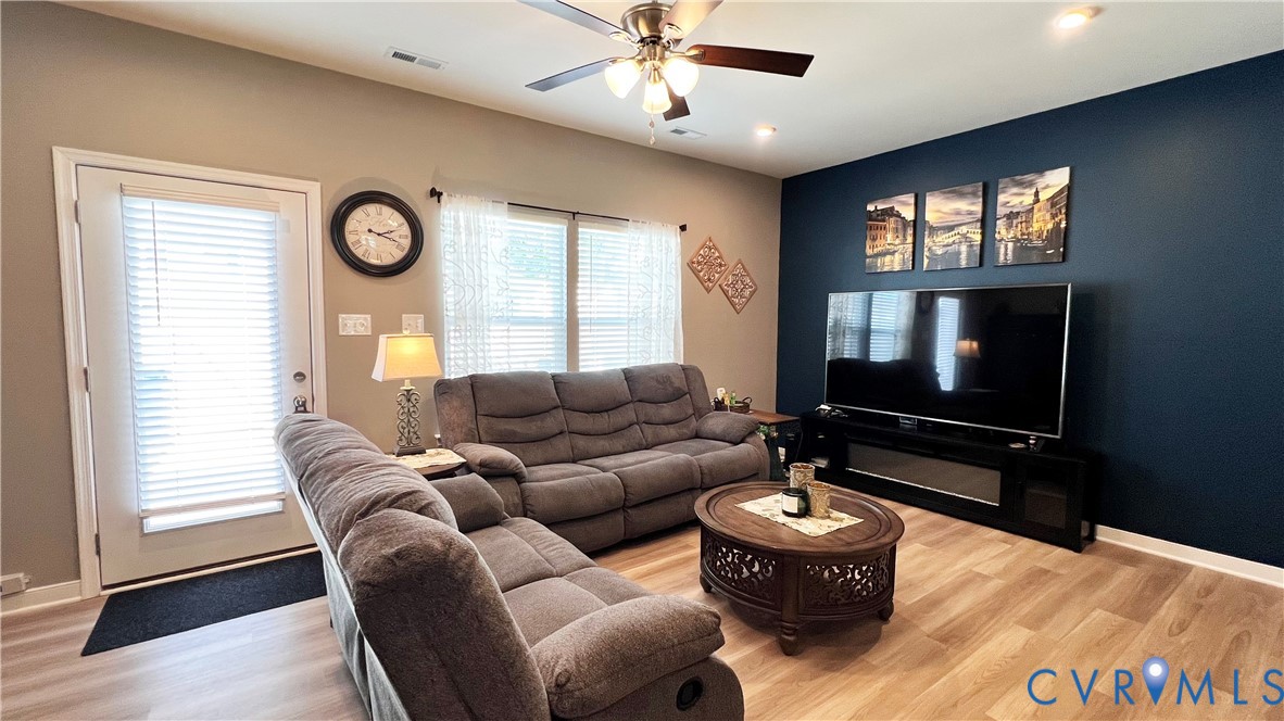223 Whiteside Road Sandston, VA 23150 - Photo 11 of 20 a living room with furniture and a large window