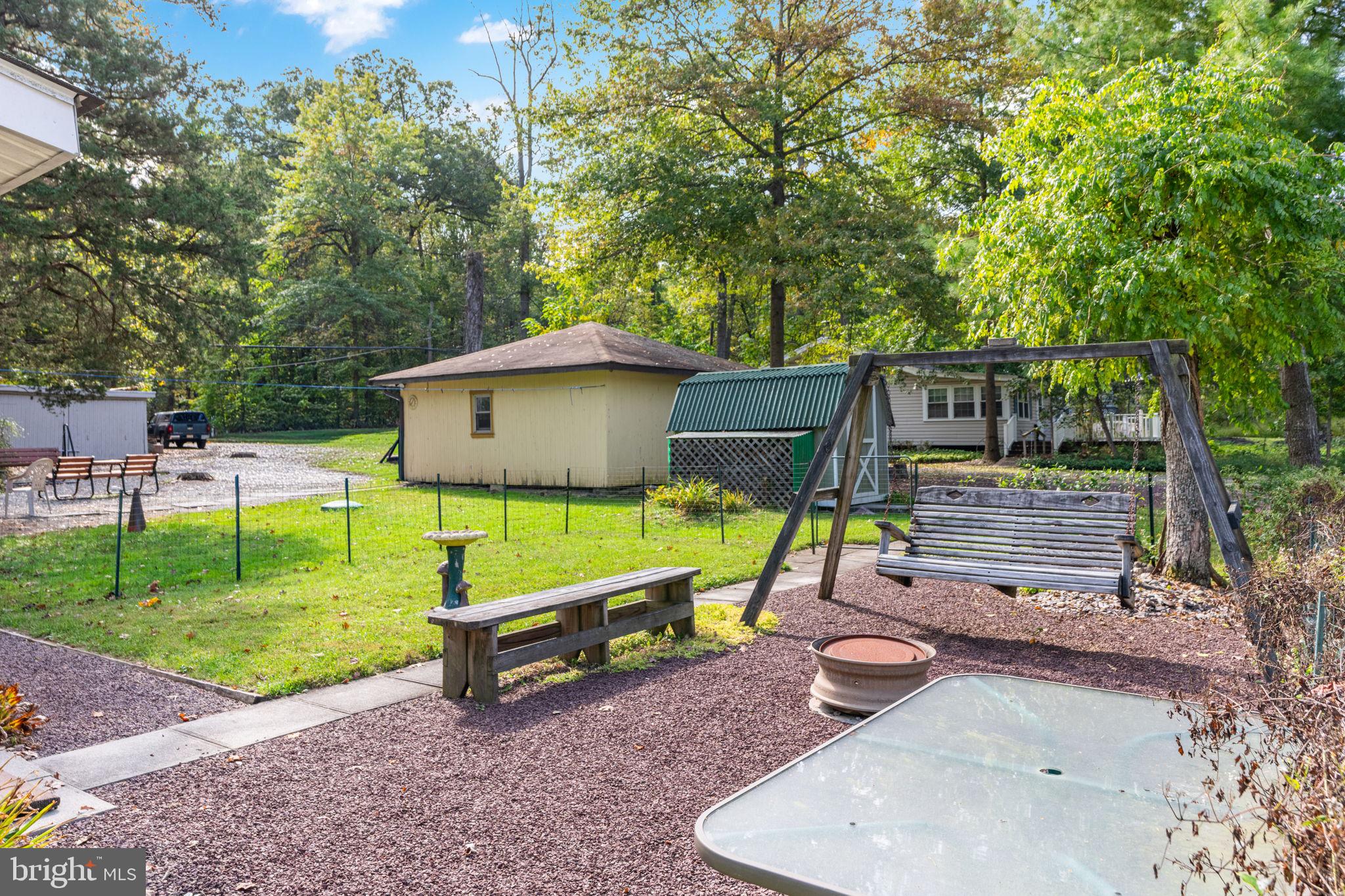 1285 Nursery Road, Unit CABIN 5 Green Lane, PA 18054 - Photo 24 of 34 a small garden covered with tall trees