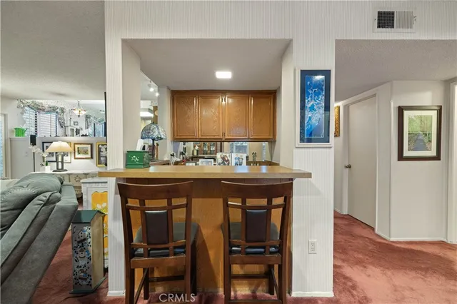 a bathroom with a sink a mirror and a bathtub