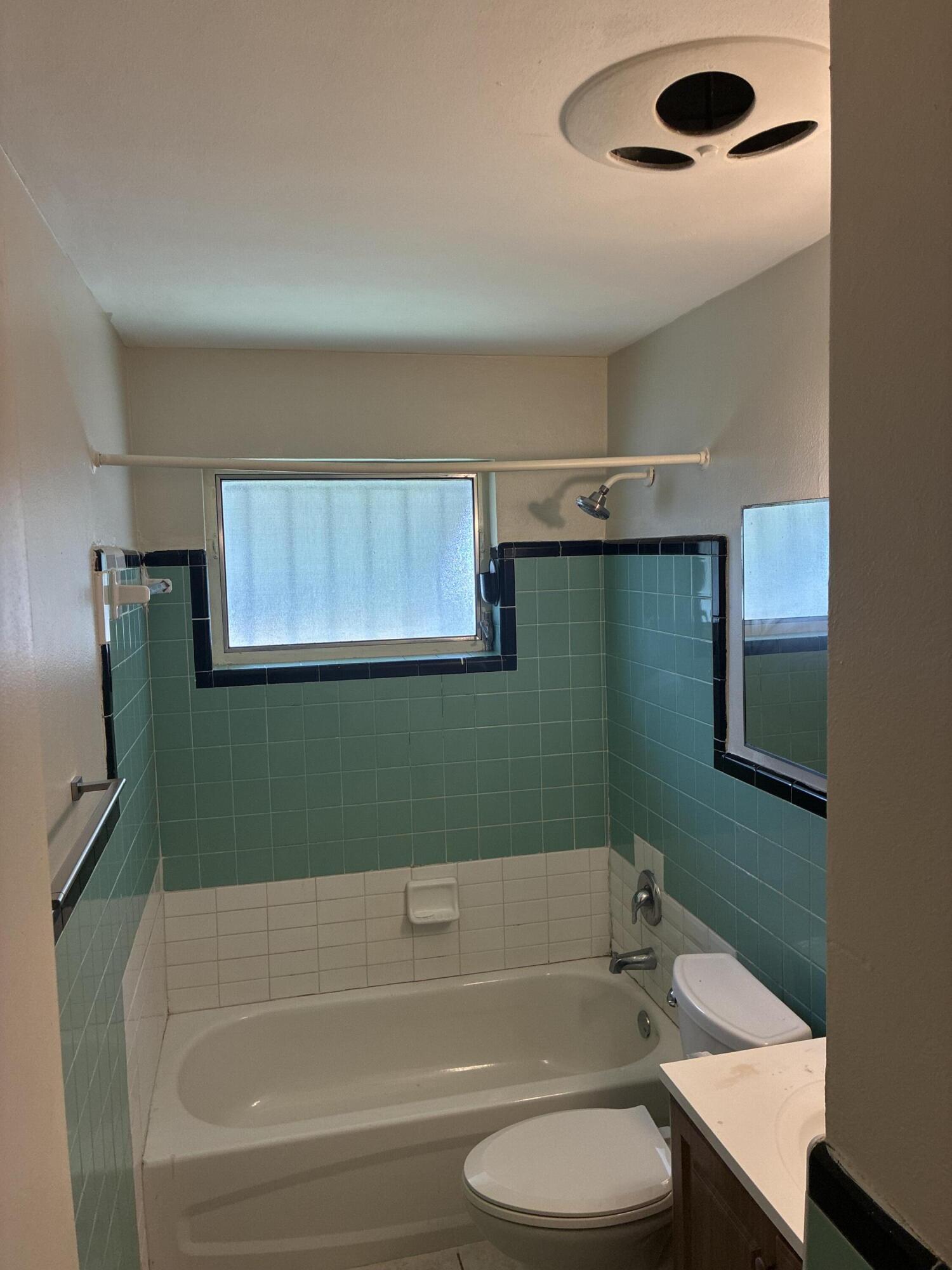 517 Silver Beach Road Lake Park, FL 33403 - Photo 8 of 10 Bathroom