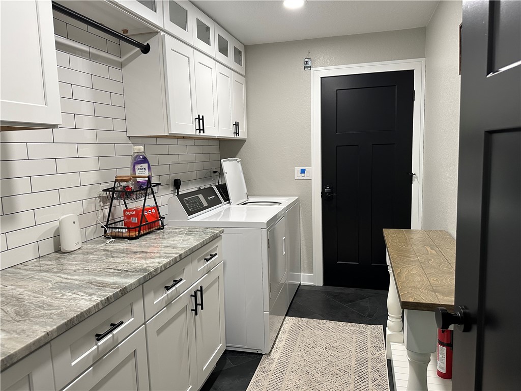 4135 Grant Road Grant Valkaria, FL 32949 - Photo 15 of 26 a kitchen with a sink and cabinets