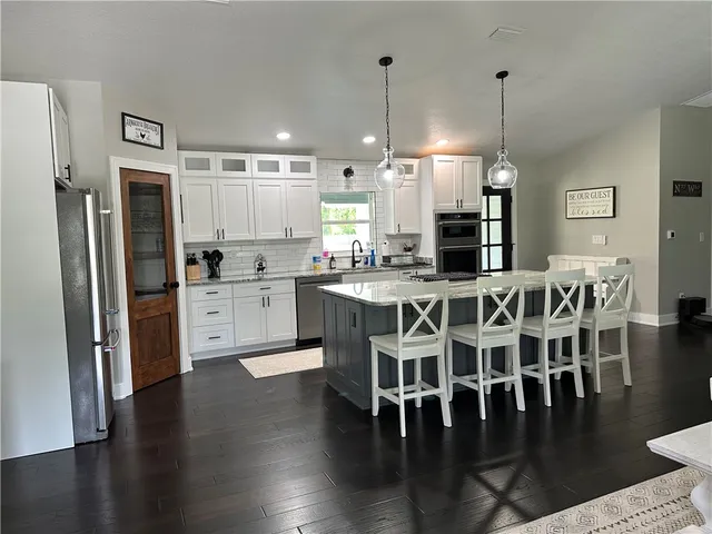 a view of a dining room with furniture
