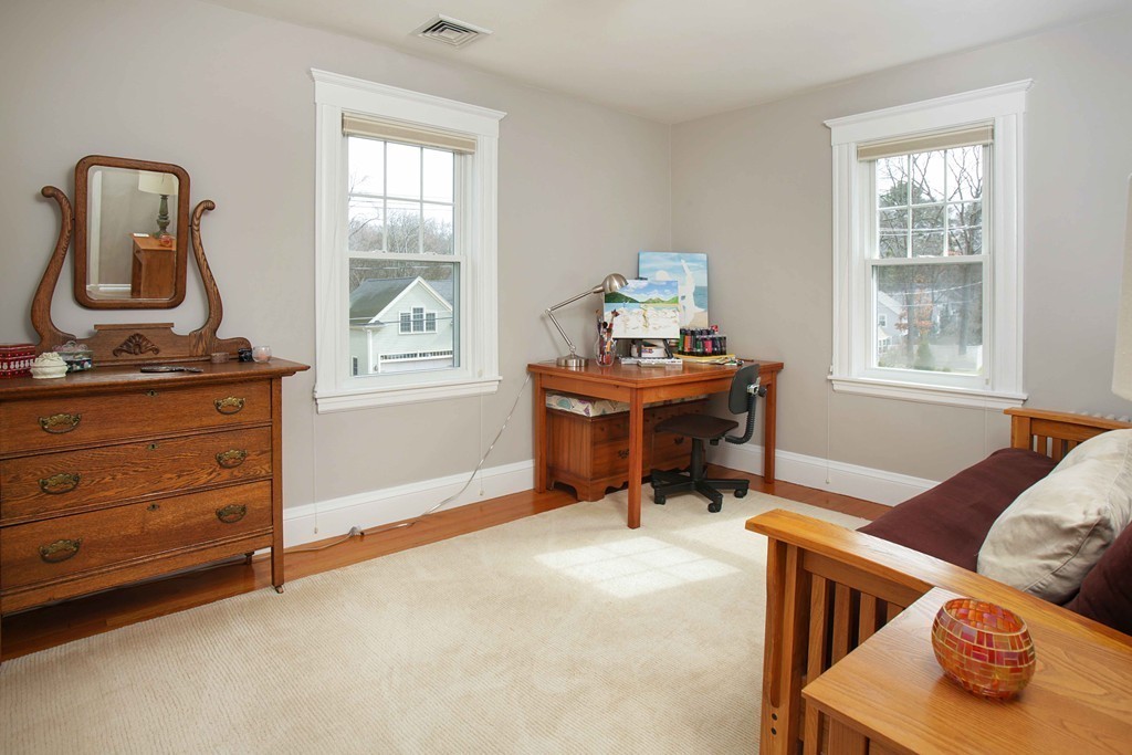 64 Martin Road Wellesley, MA 02481 - Photo 12 of 13 a living room with furniture and a window