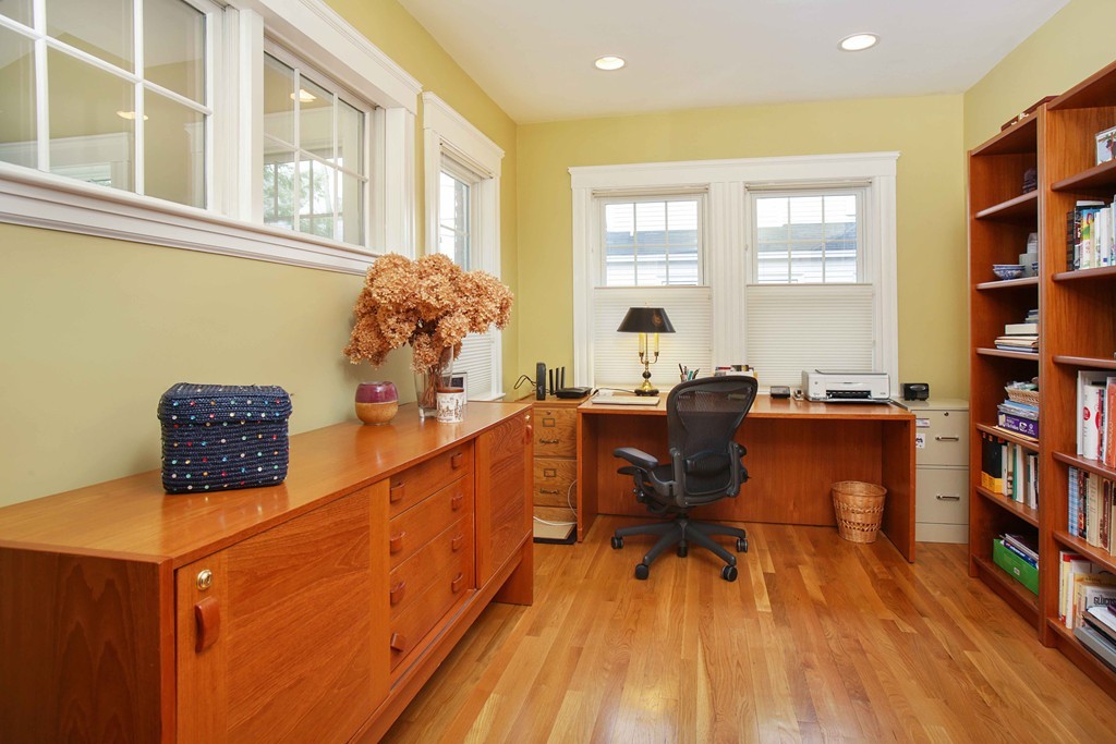 64 Martin Road Wellesley, MA 02481 - Photo 5 of 13 a living room with furniture and a book shelf