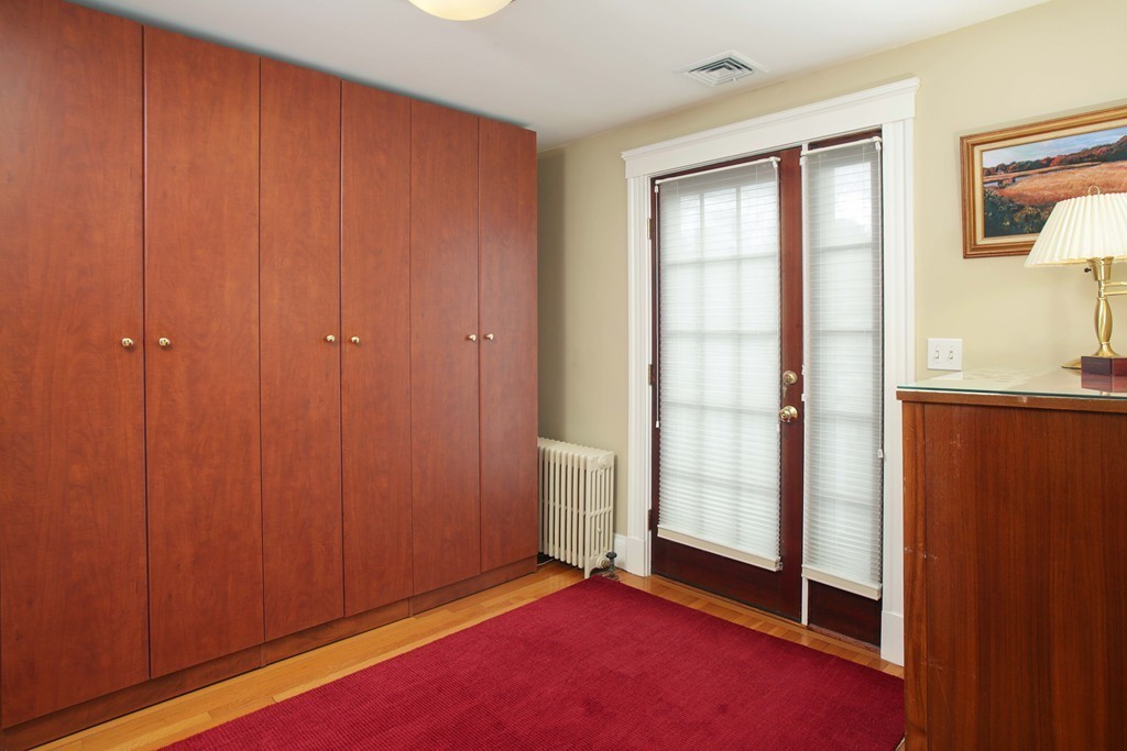 64 Martin Road Wellesley, MA 02481 - Photo 9 of 13 an empty room with windows