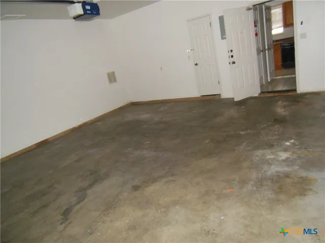 a view of a room with an empty space