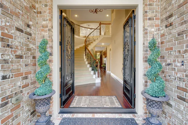 a view of entryway with wooden floor