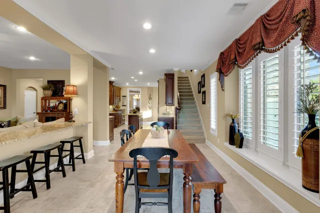 a large kitchen with stainless steel appliances lots of counter top space