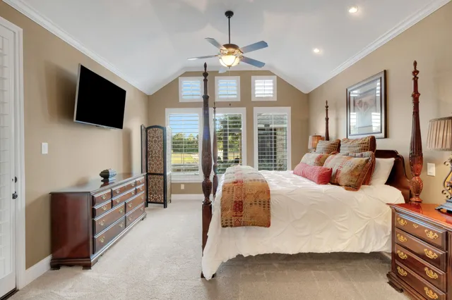 a spacious bathroom with a tub sink and mirror