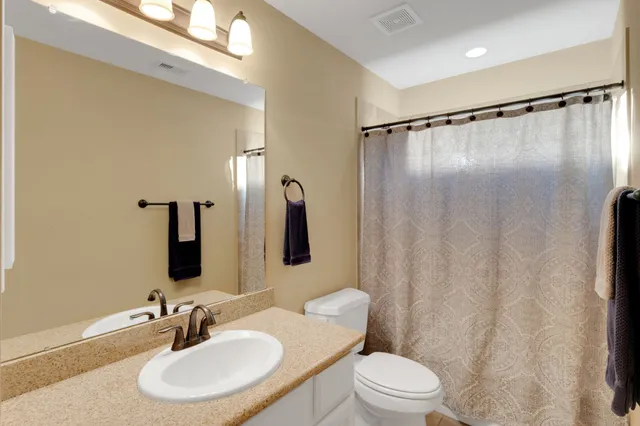 a view of kitchen with furniture and wooden floor