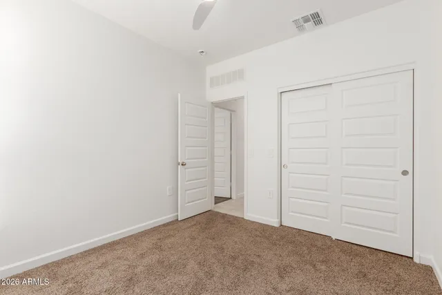 an empty room with closet
