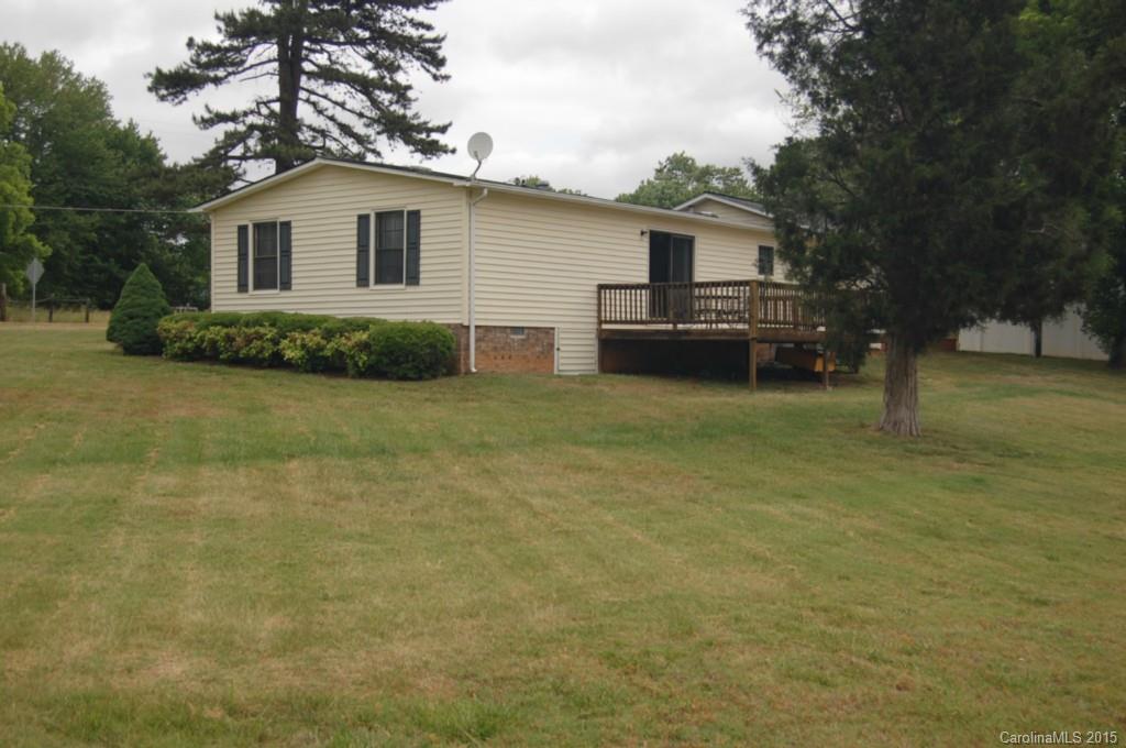 1635 West Ridge Road Salisbury, NC 28147 - Photo 2 of 11 a view of a house with a yard and sitting area