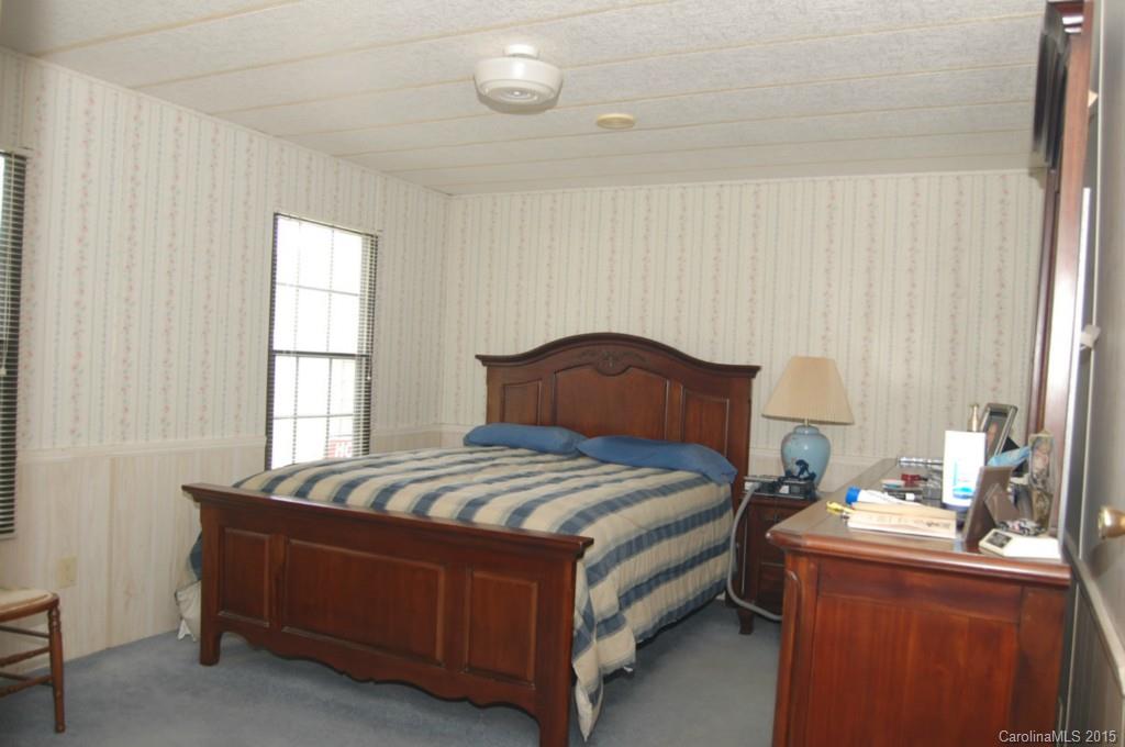 1635 West Ridge Road Salisbury, NC 28147 - Photo 8 of 11 a bedroom with a bed and a window
