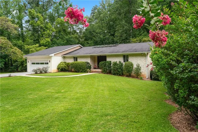 a house view with a garden space