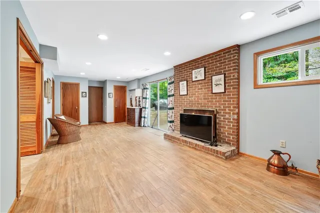 a view of livingroom with furniture and fireplace