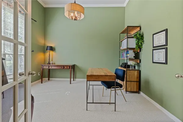 a view of a workspace with furniture
