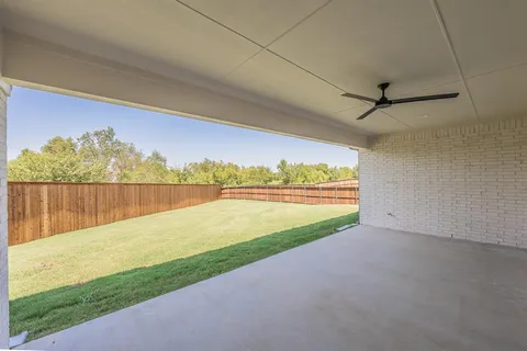 a view of swimming pool with an outdoor seating