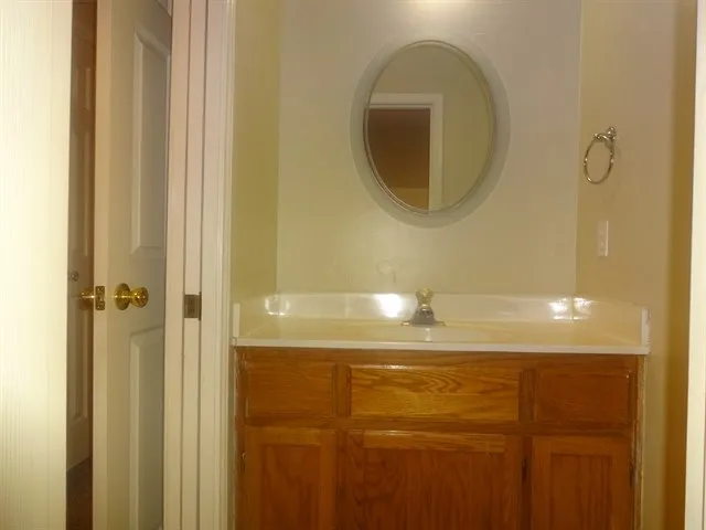 a bathroom with a mirror