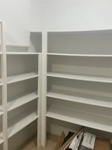 a view of room with shelf