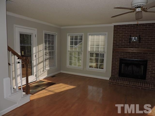 4325 Willow Lake Road Raleigh, NC 27616 - Photo 3 of 25 a view of livingroom with furniture wooden floor and window